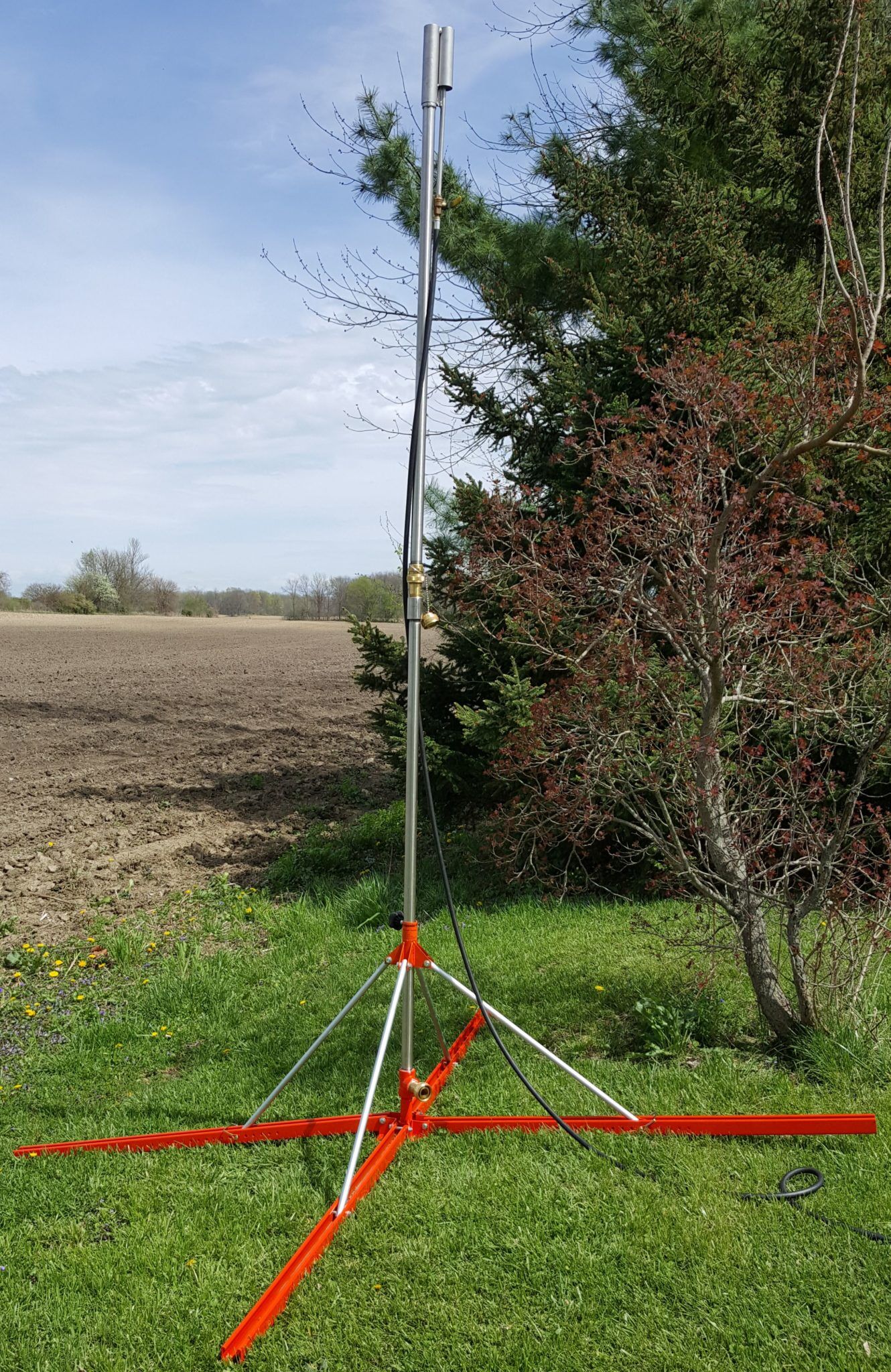 Propane flare with adjustable base on even ground